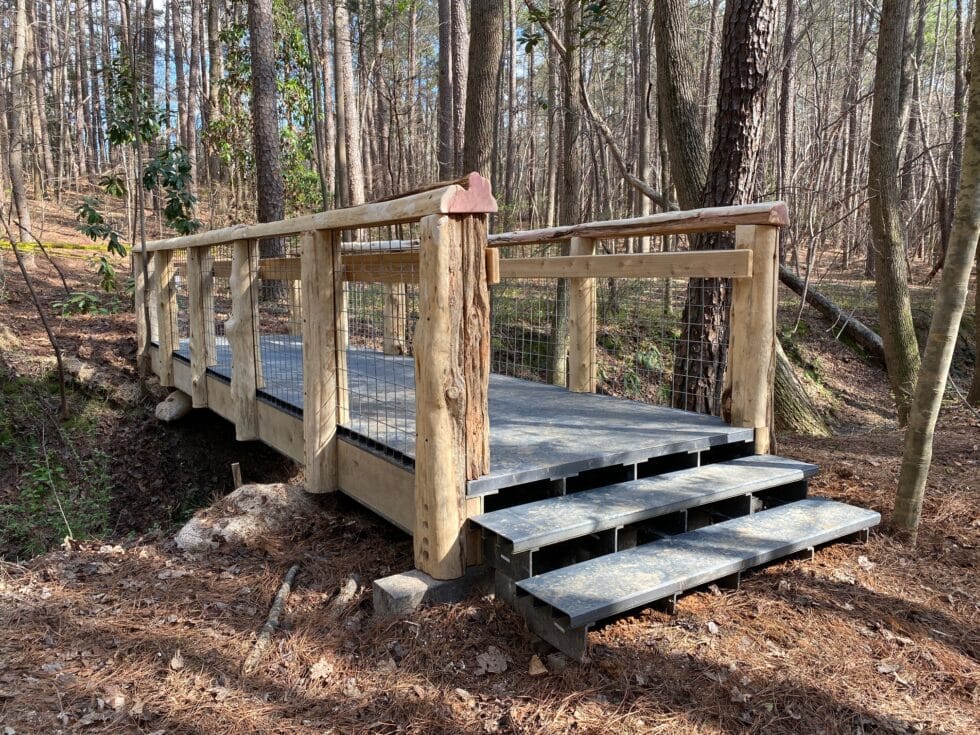 Lake Johnson Cedar Rail FRP Bridge - Arete Structures